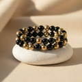 Pyrite & Obsidian Bracelet clean product shot on white stone